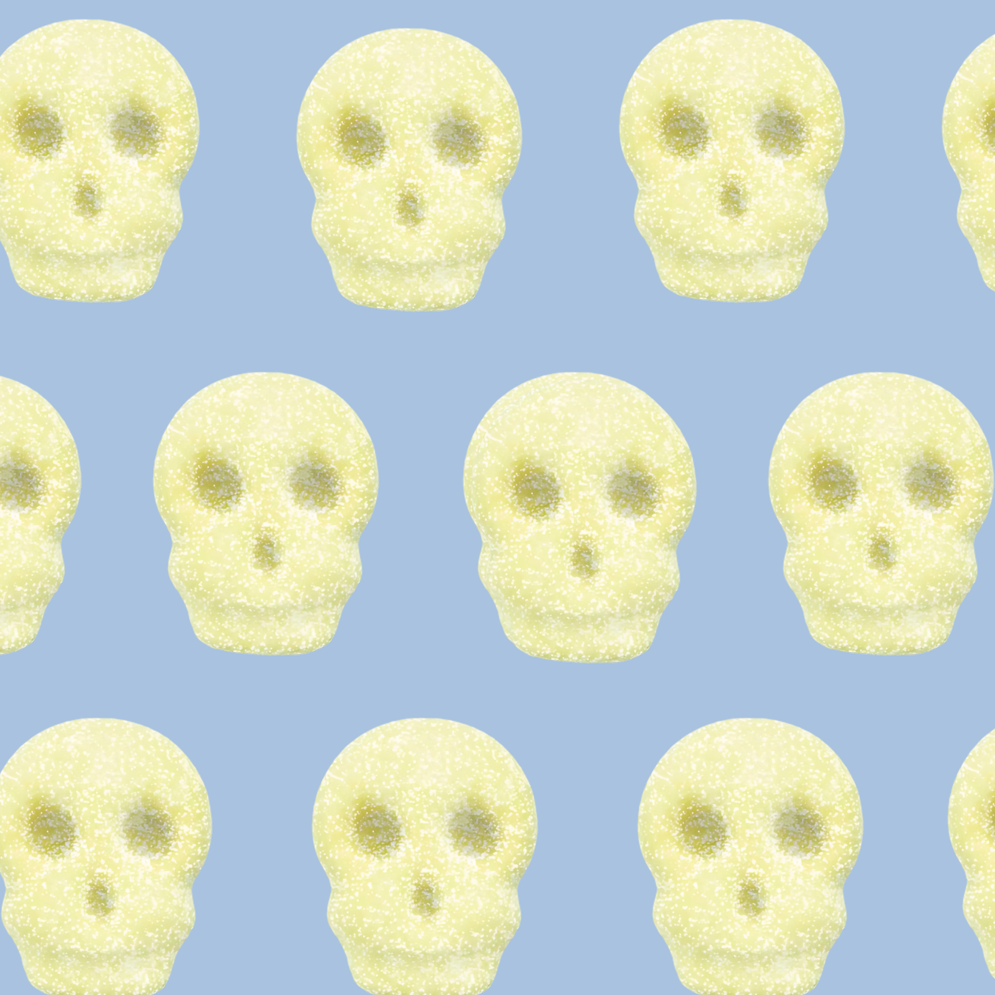 Pattern of yellow skull shapes on a blue background