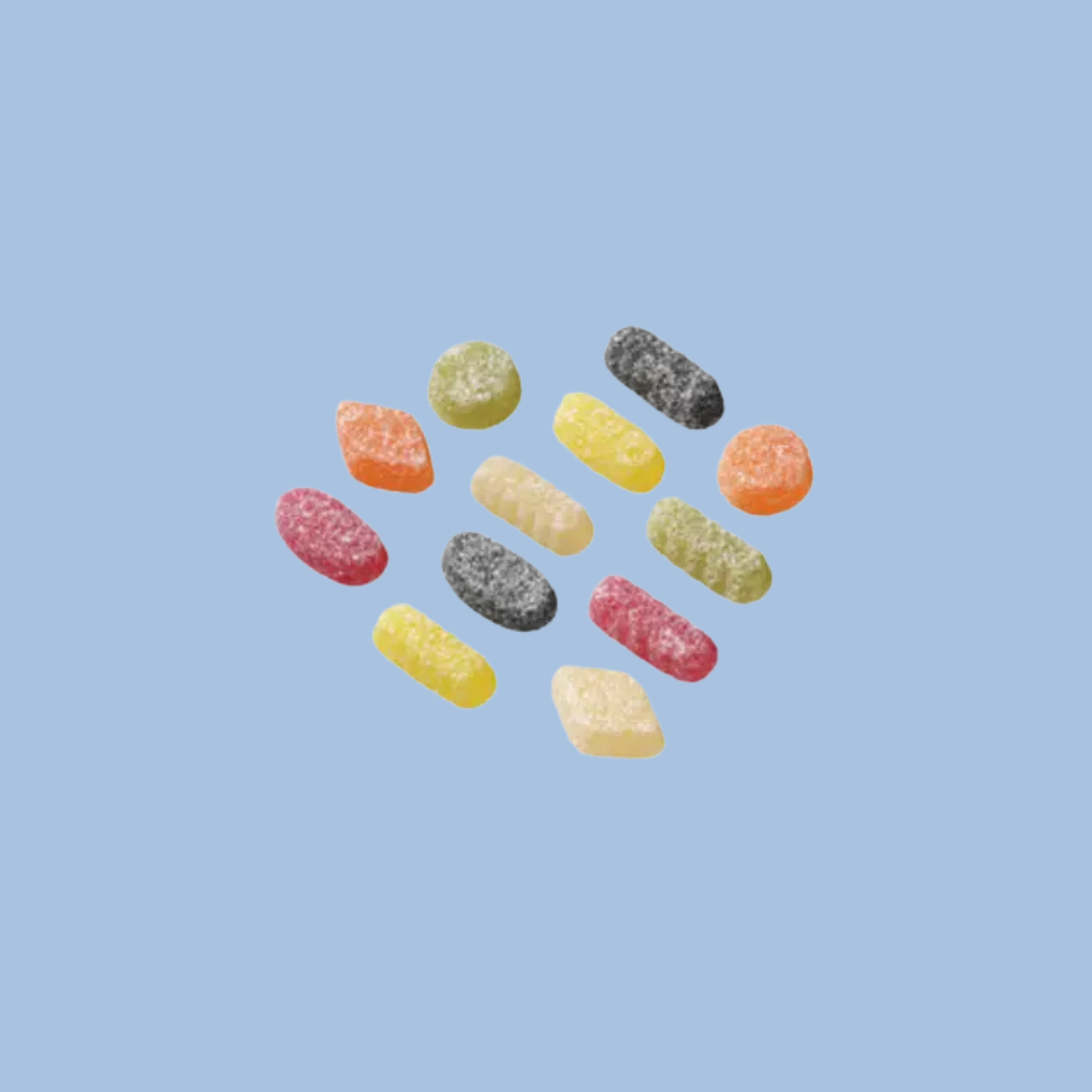 Colorful gummy candies on a light blue background